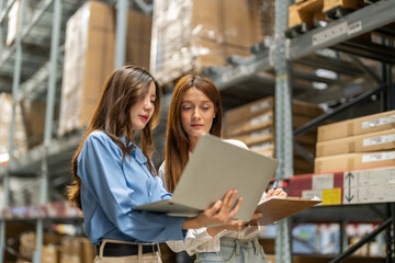 Asian warehouse staff teamwork, supply chain logistics management, shipping inventory check with...