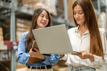 Asian warehouse staff teamwork, supply chain logistics management, shipping inventory check with...