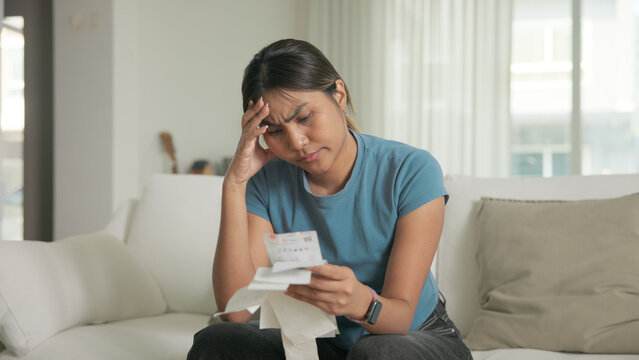 Cost of living low poor budget income black asia people Gen Z young adult woman. Looking opening Past due credit card bill debt home loan money issue asian worry tired stress in raise tax rate crisis.