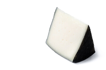 Close-up of a wedge of semi-cured cow's cheese isolated on white background. Copy space	