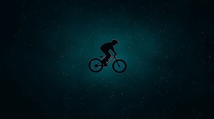 Obraz premium Cyclist Silhouette Jumping Under Starry Night Sky