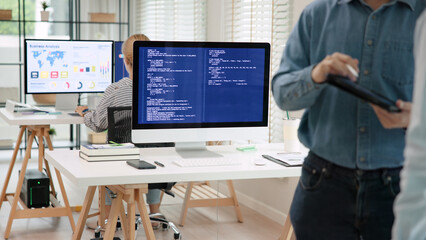 Smart AI cyber bot deep tech tools help write prompt code screen. Asia people asian man IT team...