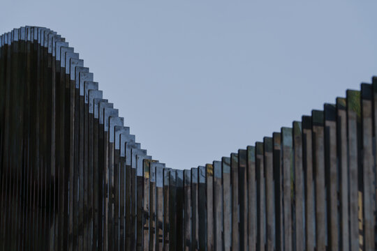 metal fence with blue sky