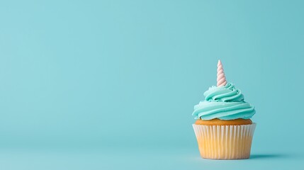 Unicorn Cupcake with Blue Frosting and Pink Horn