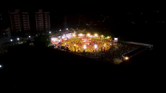 Drone shot of Navratri festival. Navratri is an Indian Festival and It spans over nine nights. crowd in round shape