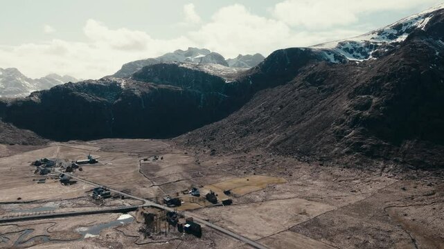Remote Village Down The Mountains Of Ytresandheia In Roren, Norway. Aerial Drone Shot