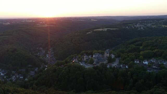 Slot burg, castle in Burg an der Wupper , a borough of the German city of Solingen. Aerial drone video at sunset.