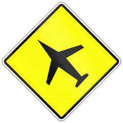 Warning road sign in Cambodia - Low flying air craft