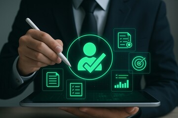 Business professional using a stylus to interact with digital user profile and business icons