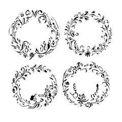 A black and white outline of a blooming flower with detailed petals and leaves. 