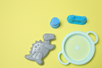 Children's toys on a yellow background