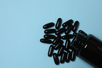 loose tablets on a blue background