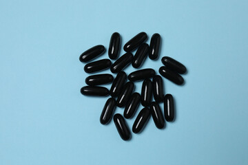 loose tablets on a blue background