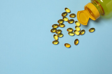 loose tablets on a blue background