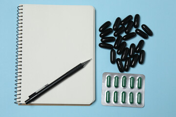 loose tablets on a blue background
