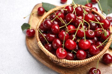 Fresh ripe cherries on light table, closeup