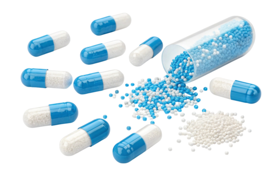 Scattered blue and white capsules and pellets isolated on transparent background