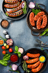Banner with sausages for grill or barbecue. Top view. On a gray slate background.