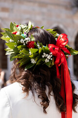 Graduate Woman with Laurel Wreath and Red Roses