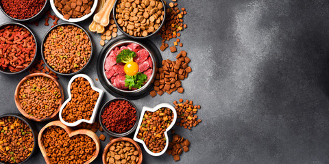 A set of dry food for dogs and cats. A type of nutritious food for pets. Banner.