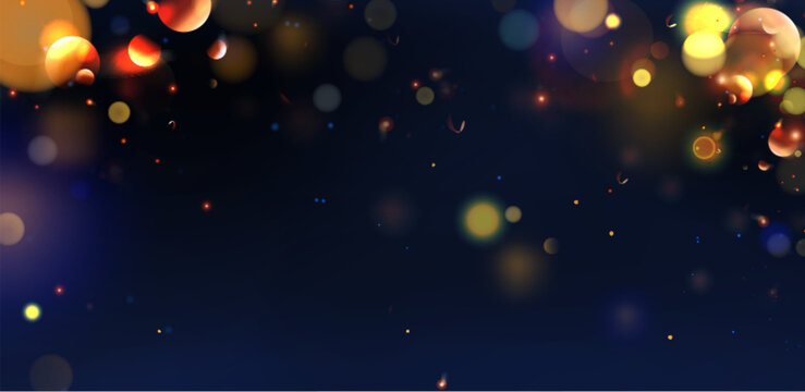 Festive bokeh lights on dark blue background - gold yellow orbs floating with bright sparkles. Blurred glowing circles and shimmering dots for celebration wallpaper or holiday party backdrop design.