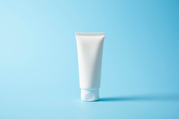 A template for advertising creams, lotions, shampoos, and toothpastes. a white cream tube with no labels on a gray background.