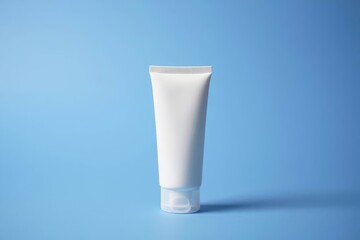A template for advertising creams, lotions, shampoos, and toothpastes. a white cream tube with no labels on a gray background.