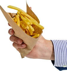 Close-up of male hand holding fresh French fries in brown paper cone, isolated on transparent...
