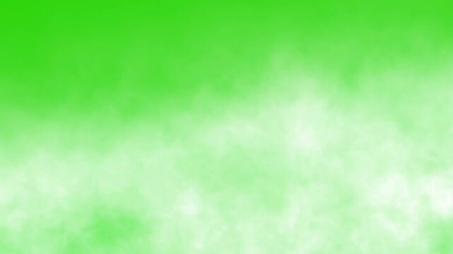 Moving white smoke or fog effect on green screen background. Atmospheric smoke in slow motion Seamless looping for visual effects. 4k Video footage