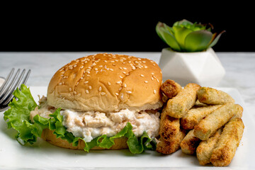 tuna salad  sandwich with broccoli fries