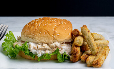 tuna salad  sandwich with broccoli fries