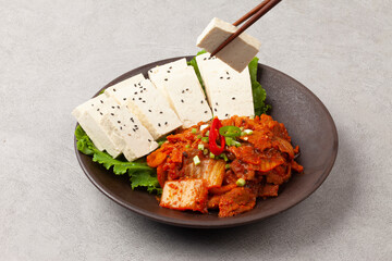 Tofu kimchi is a dish made by boiling tofu and eating it with stir-fried kimchi.