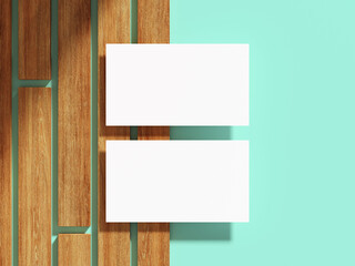 Elegant business card resting on wooden boards, minimalistic design.