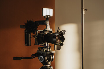 Professional Video Camera Rig with Microphone and LED Light on Tripod