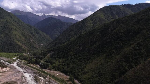Talgar gorge, Tian Shan Mountains. Different vegetation and a mountain river. The view from the drone.