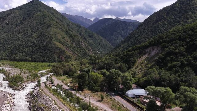 Talgar gorge, Tian Shan Mountains. Different vegetation and a mountain river. The view from the drone.