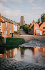 A small town with a church and houses