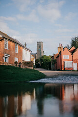A small town with a church and houses