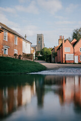 A small town with a church and houses