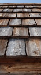Detailed close-up of wooden shingles roof in vertical composition for architectural design.