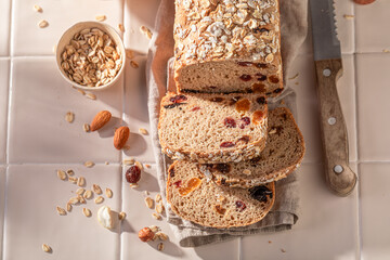Healthy delicacies bread with bran, nuts and raisins.