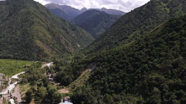Talgar gorge, Tian Shan Mountains. Different vegetation and a mountain river. The view from the drone.