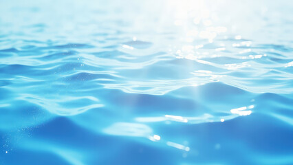 Close up of blue water surface with gentle waves and sunlight reflections creating a serene and tranquil scene