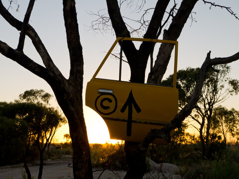 Lightning Ridge car door tourist direction sign