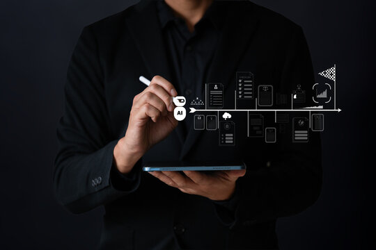 The business man Using AI robots to help analyze and enhance business plans to increase business efficiency