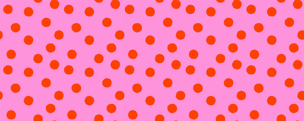 Seamless pattern background with orange dots on pink. Vector confetti polka dot texture, simple and playful abstract print. Perfect for fabric, wrapping paper, wallpaper, branding. Drag to swatches.