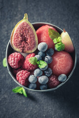 Fresh ice cream sorbet with watermelon and berries.