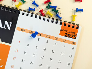 1st september marked with push pin on calendar 2025
