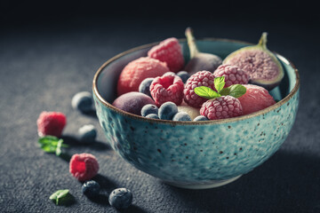 Cold ice cream sorbet with mix of frozen fruits