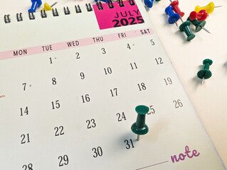 31st July date marked with push pin on calendar 2025